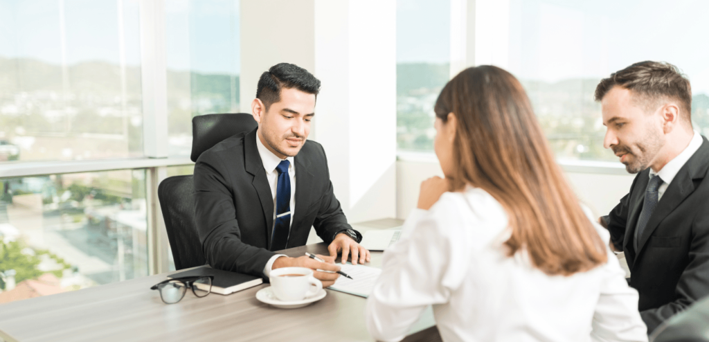 A business meeting talking about installment loans in California.